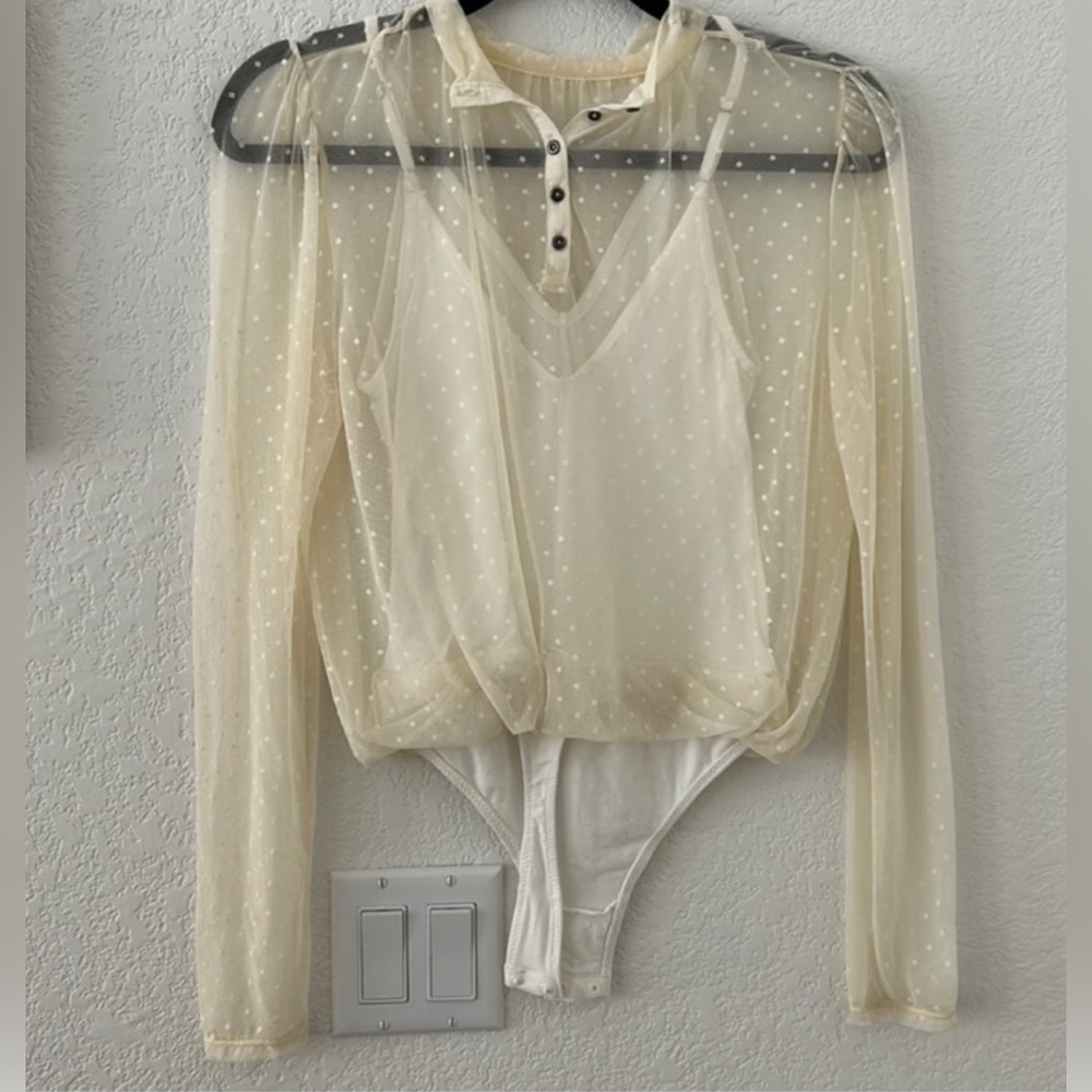 ivory free people body suit.